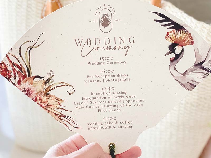 Wedding ceremony fan with a tassel