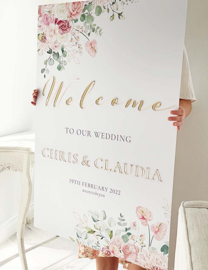 Claudia-Chris-welcome-board