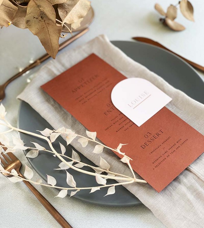 Rust menu card with bluch arched place card