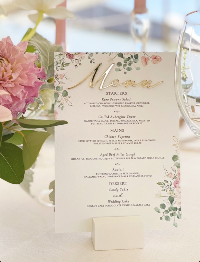 Floral and acrylic table menu