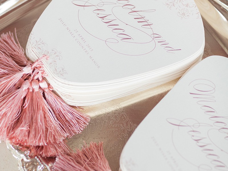 Malcolm and Jessica program fan with tassel