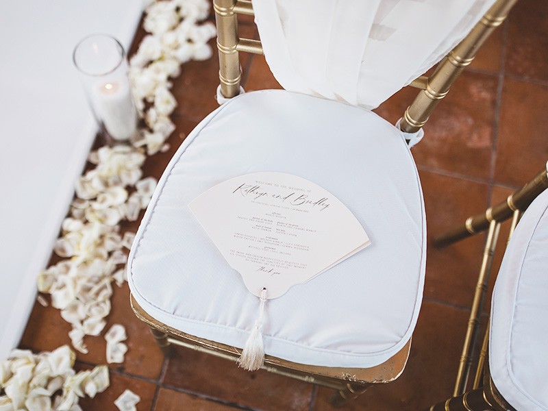 Kathryn and Bradley program fan