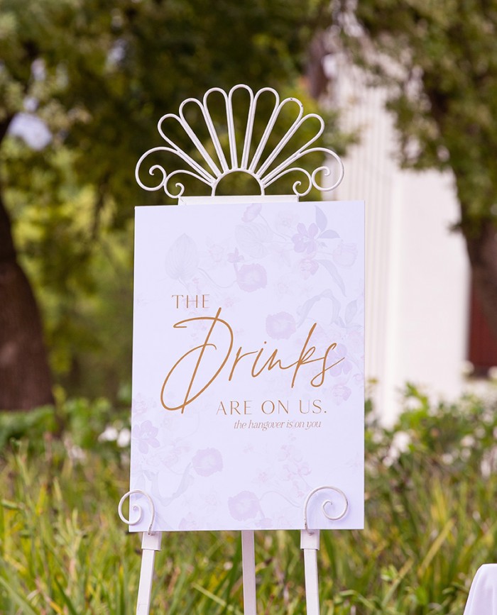 Mel and Steve wedding drinks sign