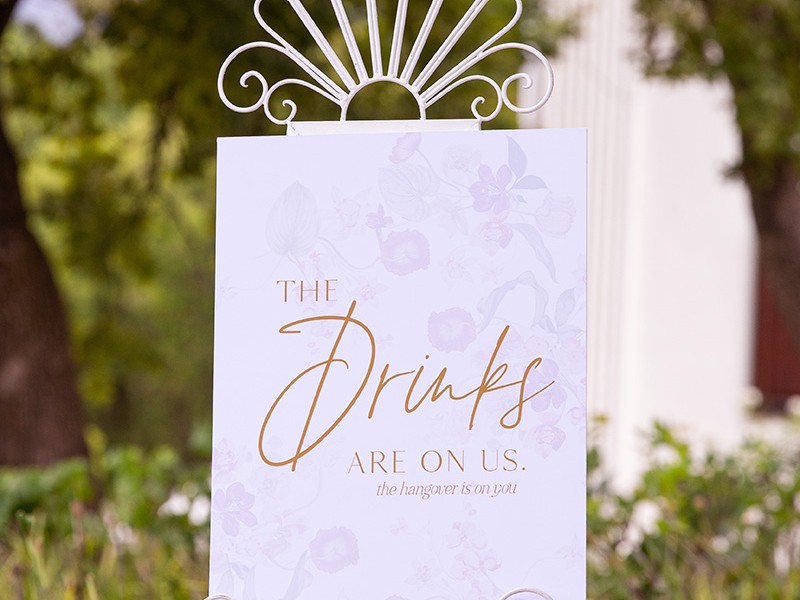 Mel and Steve wedding drinks sign