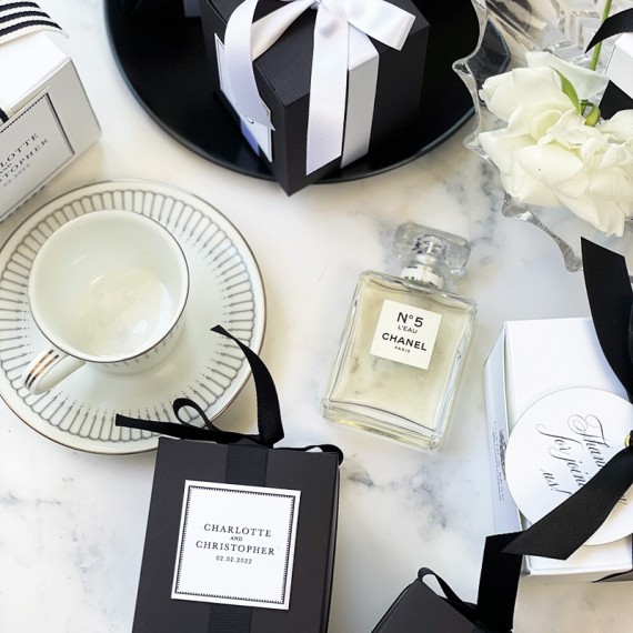 Black and white flat lay favour boxes