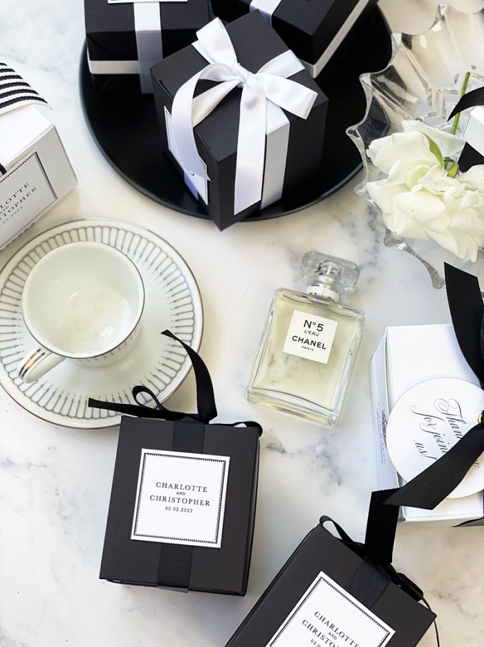 Black and white flat lay favour boxes