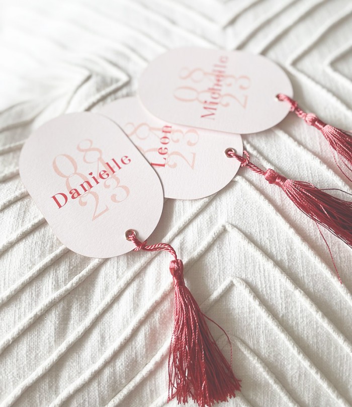 Capsule shaped place cards with tassel