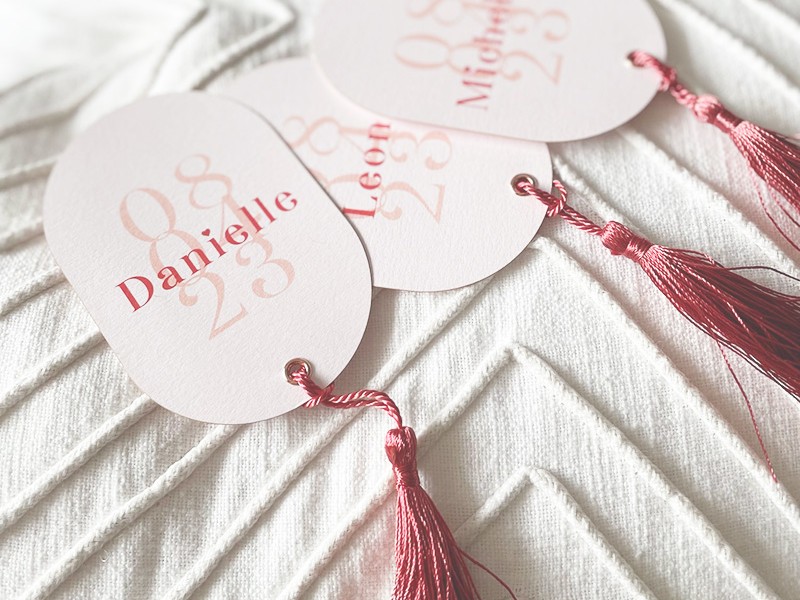 Capsule shaped place cards with tassel
