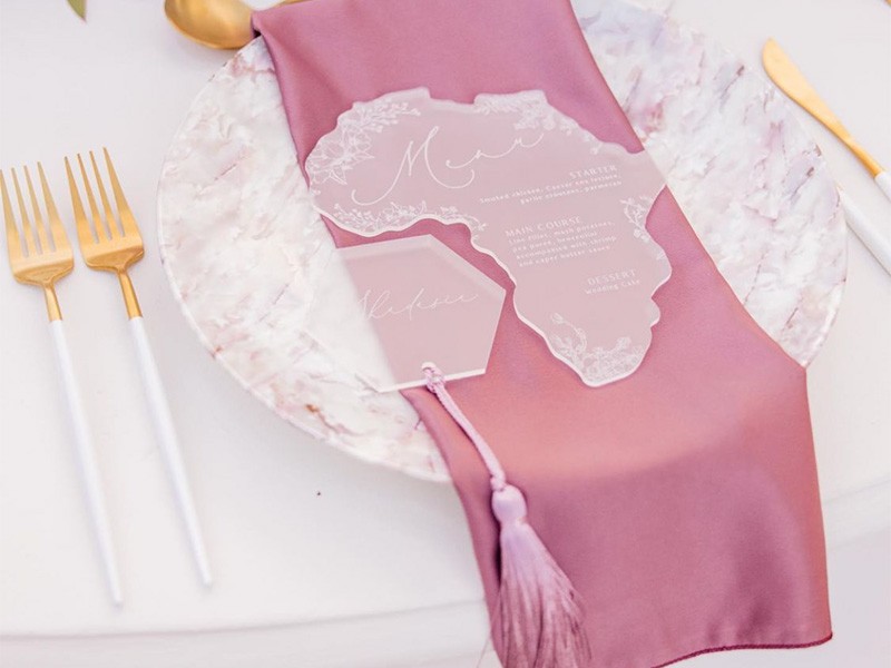 Continent shaped acrylic menu and place tag