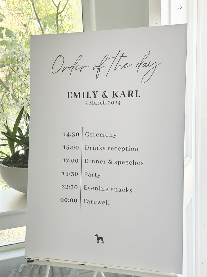 Emily & Karl order of the day sign