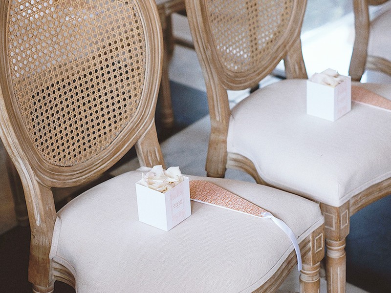 Lebi and Kwame program fans and confetti boxes