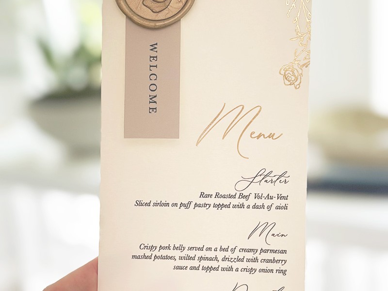 Claudia and MJ foiled menus with wax seal