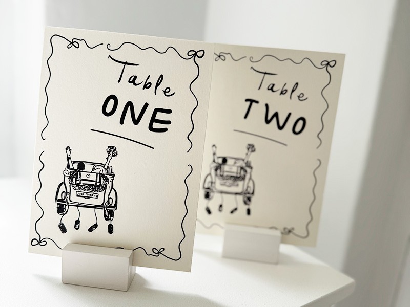 Chelsea and Rufus table number cards